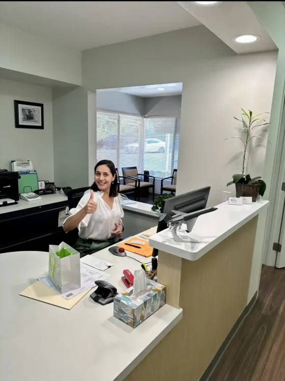 Satisfied CoreConnectIT customer giving a thumbs up