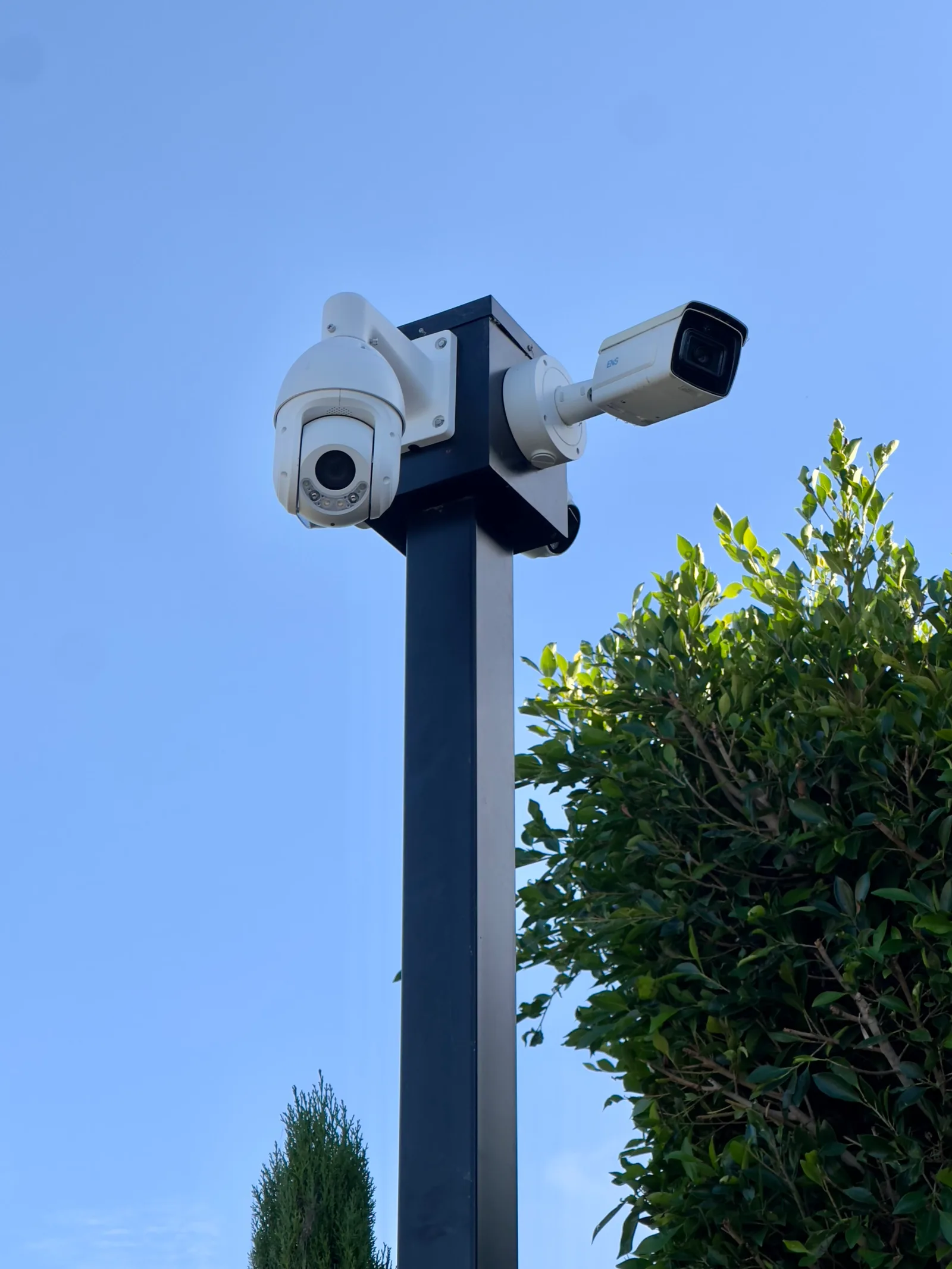 AI PTZ surveillance camera installed on a pole in Orange County