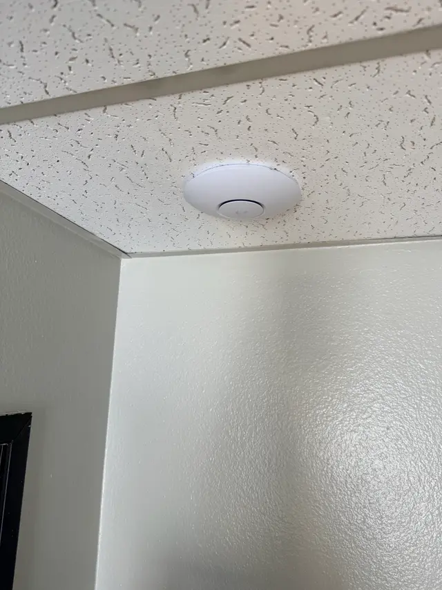 Business Wi-Fi access point ceiling-mounted for wall-to-wall coverage