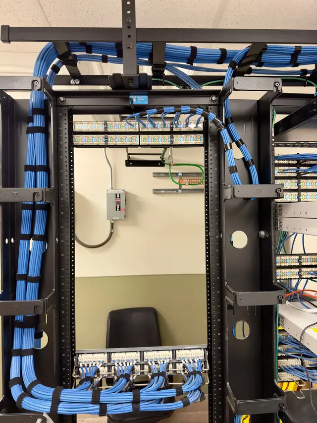 IDF rack and cabled wall field during a hospital buildout
