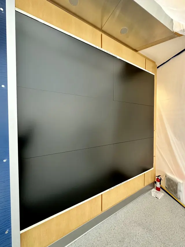 Professional large-format healthcare video wall installation with precision panel alignment