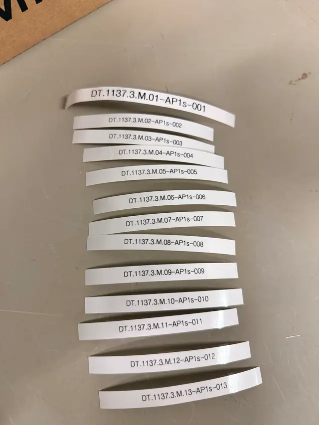Printed cable labels identifying every run on a structured cabling job
