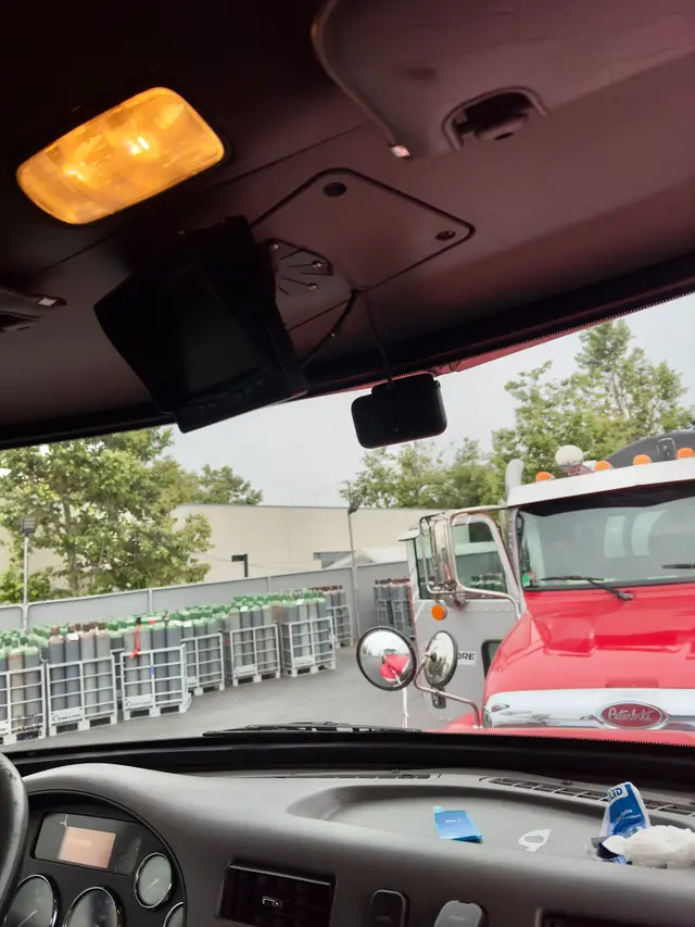 Completed dash camera installation in a work truck
